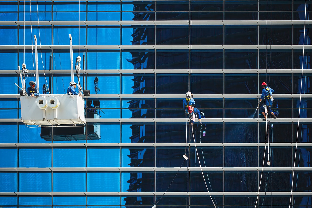 our-story workers, windows, building, cleaners, cleaning, service, maintenance, crane cradle, glass, reflection, high-rise building, skyscraper, urban, city, workers, workers, cleaning, cleaning, cleaning, cleaning, cleaning, service, maintenance, maintenance, maintenance